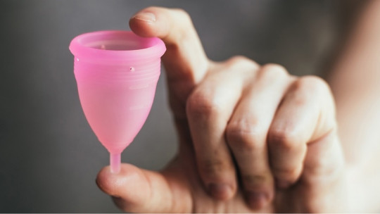 A pink menstrual cup.