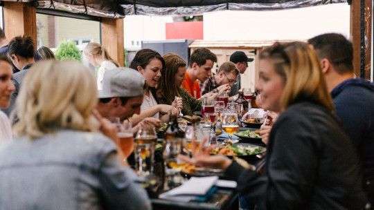 Social Facilitation of Food: Why We Eat More with Friends