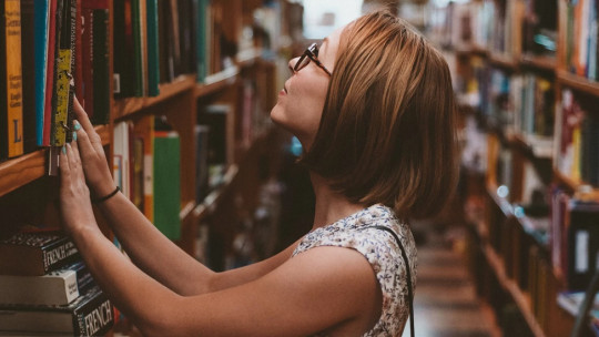 Woman in a library.