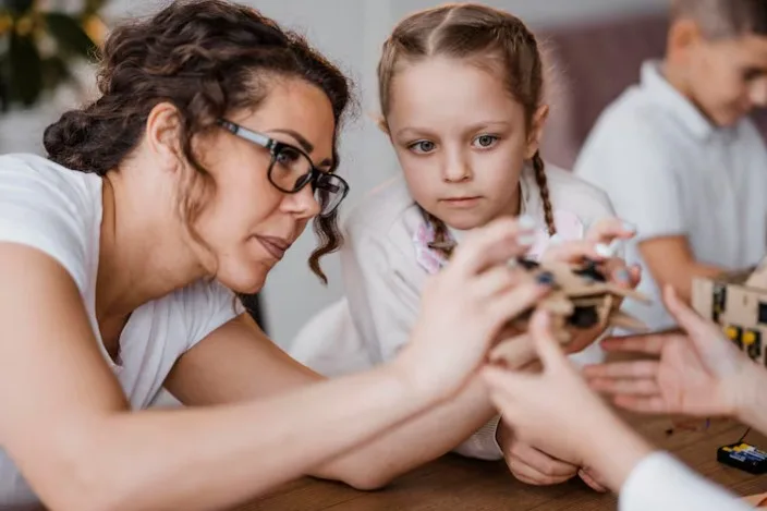 Why Children and Adults Form Memories Differently